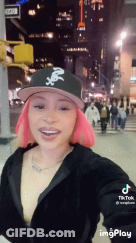 Woman With Pink Hair Taking Selfie GIF