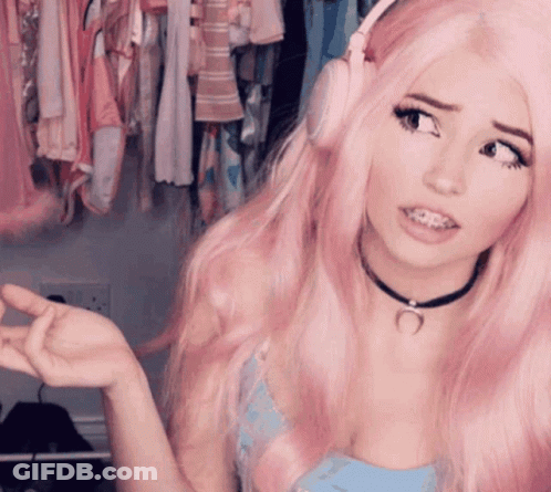 Woman With Pink Hair Wearing Headphones And Choker GIF