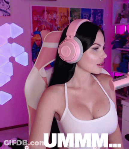 Woman With Pink Headphones In Pink Chair Saying Ummm GIF