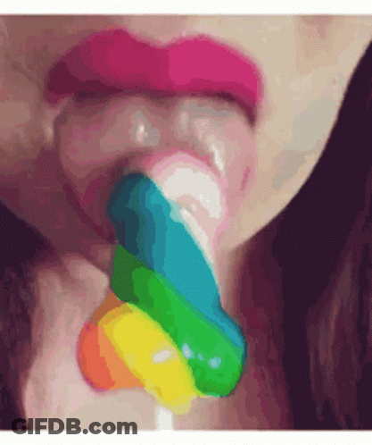 Woman With Pink Lips Licking Colorful Lollipop GIF