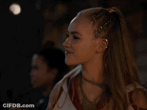 Woman With Ponytail And Glitter In Hair GIF