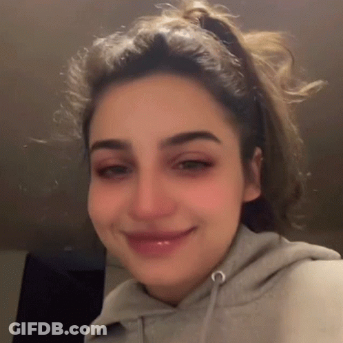 Woman With Ponytail And Hoodie GIF
