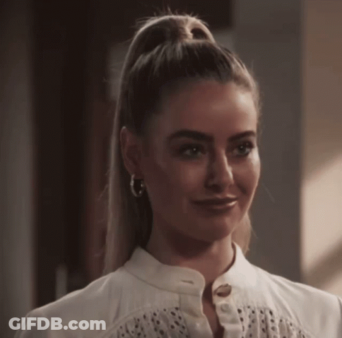 Woman With Ponytail And Hoop Earrings GIF