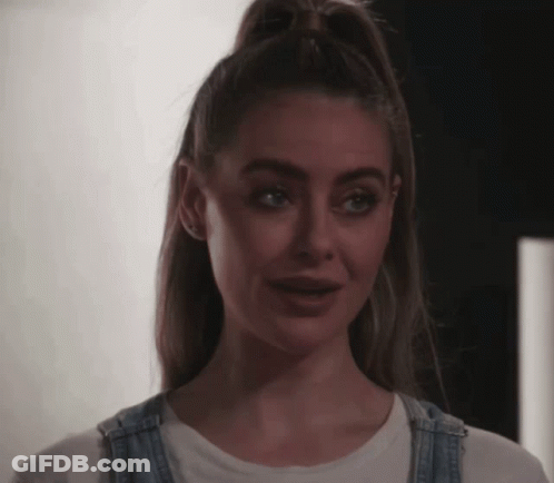 Woman With Ponytail And Overalls GIF