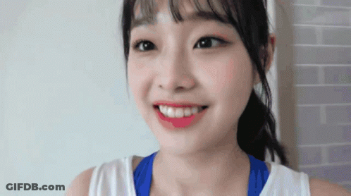 Woman With Ponytail And Red Lipstick GIF