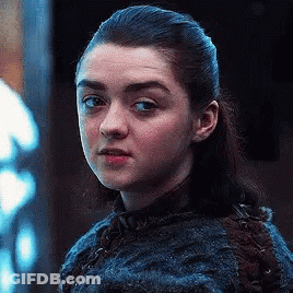 Woman With Ponytail Serious Look GIF