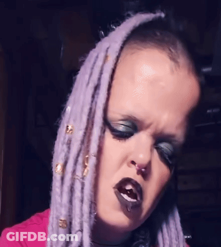 Woman With Purple Dreadlocks And Nose Ring GIF
