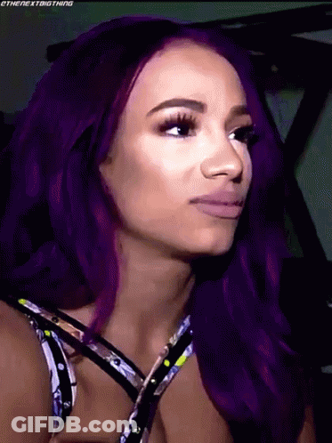 Woman With Purple Hair And Floral Tank Top GIF