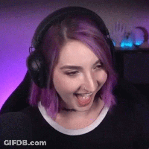 Woman With Purple Hair And Headphones Making Funny Face GIF