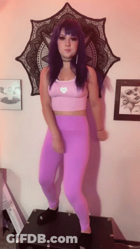 Woman With Purple Hair And Heart Top GIF