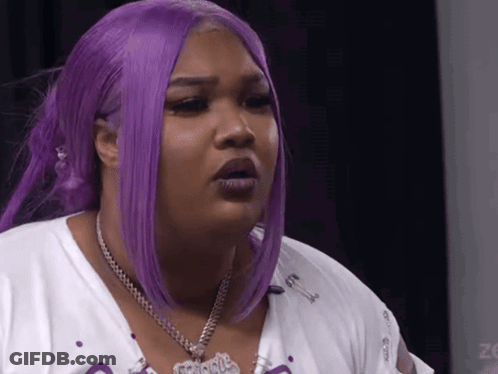 Woman With Purple Hair And White Shirt And Necklace GIF
