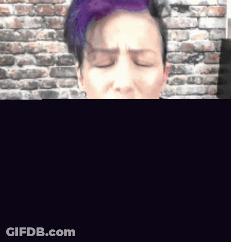 Woman With Purple Hair Asking What Is Holding You Back GIF
