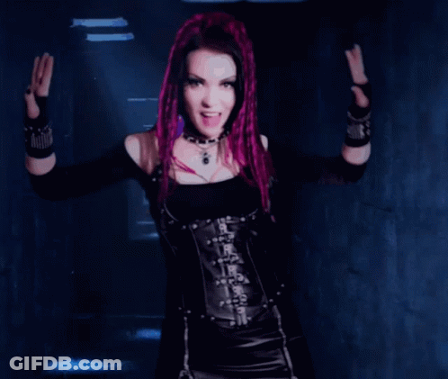 Woman With Purple Hair In Black Top And Corset GIF