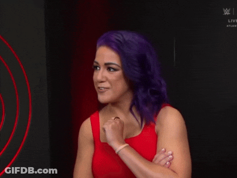 Woman With Purple Hair In Red Dress GIF