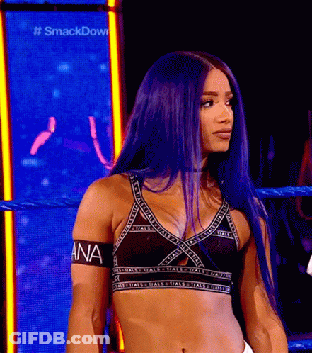 Woman With Purple Hair In Wrestling Ring Wearing Ana Bra GIF
