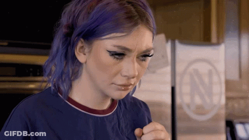 Woman With Purple Hair Looking At Something GIF