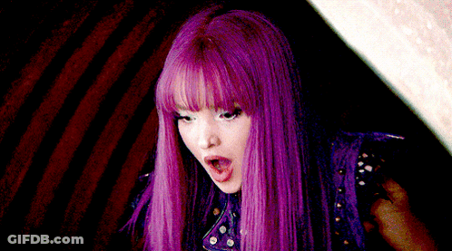 Woman With Purple Hair Making Funny Face GIF