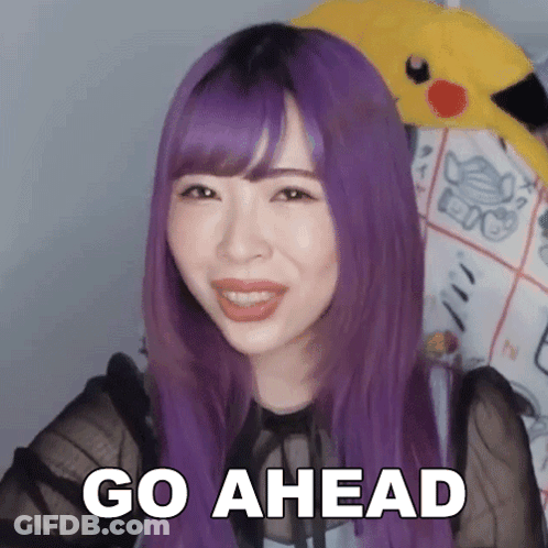 Woman With Purple Hair Says Go Ahead GIF