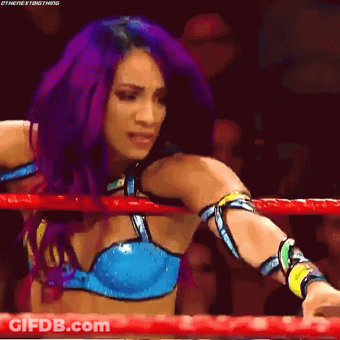 Woman With Purple Hair Standing In Ring GIF