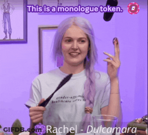 Woman With Purple Hair Wearing Healthcare Shirt GIF