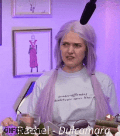 Woman With Purple Hair Wearing Rachel Shirt GIF