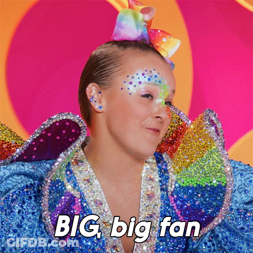 Woman With Rainbow Bow Says Big Big Fan GIF