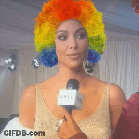 Woman With Rainbow Wig Being Interviewed GIF