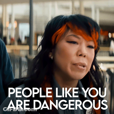 Woman With Red And Black Hair Says People Like You Are Dangerous GIF