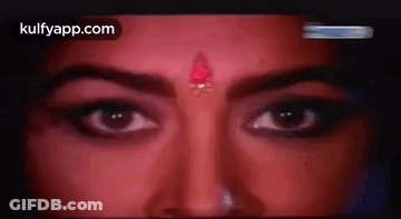Woman With Red Bindi Close Up GIF