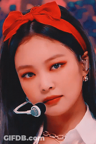 Woman With Red Bow On Head GIF