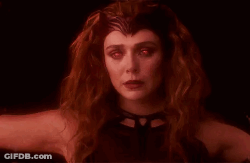 Woman With Red Eyes And Red Hair GIF