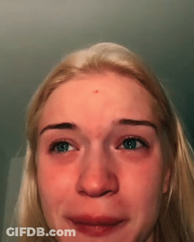 Woman With Red Forehead Spot Making Funny Face GIF