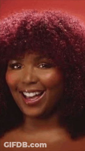 Woman With Red Hair And Big Afro GIF