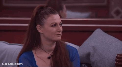 Woman With Red Hair And Blue Shirt Smiling GIF