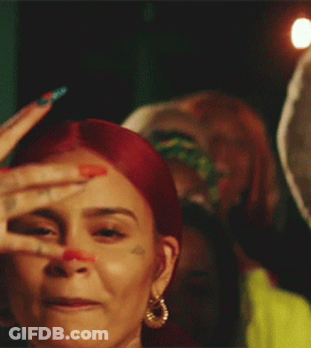 Woman With Red Hair And Face Tattoo GIF