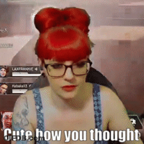 Woman With Red Hair And Glasses Saying Cute GIF
