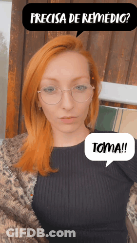 Woman With Red Hair And Glasses Saying Toma GIF
