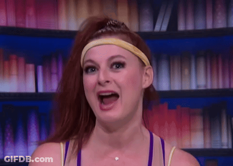 Woman With Red Hair And Headband Smiling GIF