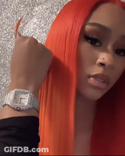 Woman With Red Hair And Silver Watch GIF