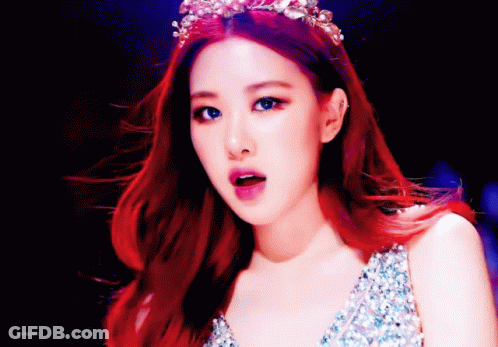 Woman With Red Hair And Tiara GIF