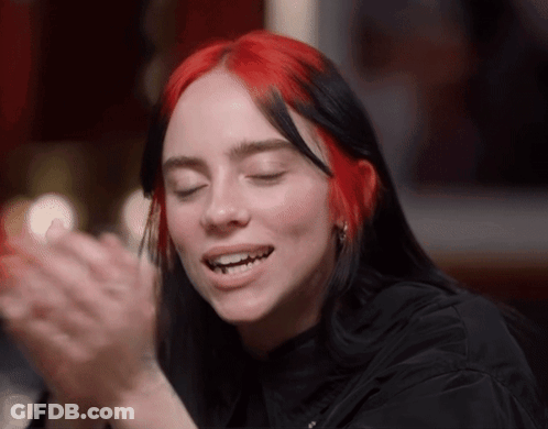 Woman With Red Hair Clapping Hands GIF