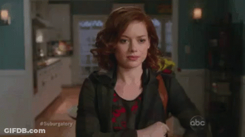 Woman With Red Hair Giving Thumbs Up GIF