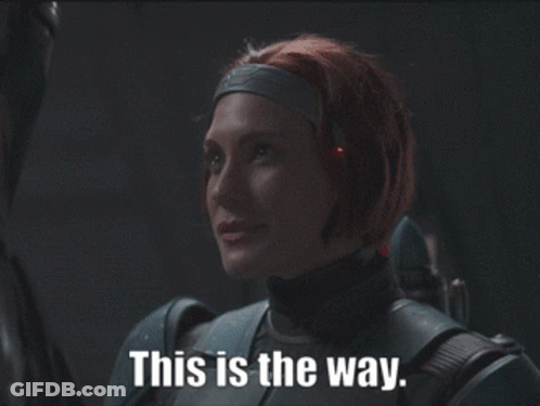 Woman With Red Hair Holding Gun GIF