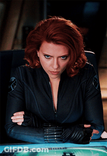 Woman With Red Hair In Black Jacket GIF