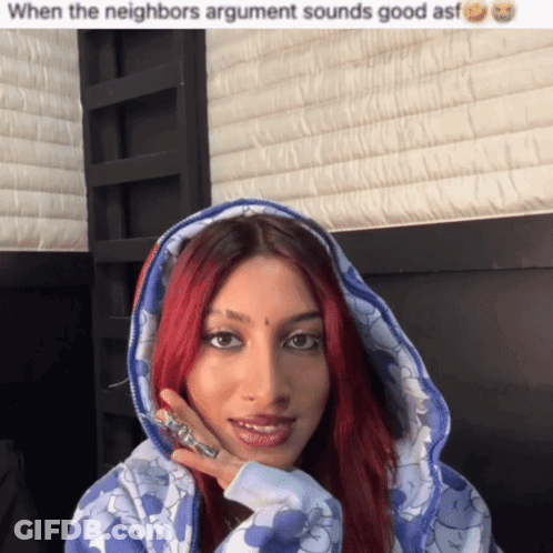 Woman With Red Hair In Blue Hoodie GIF