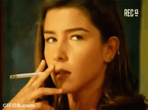 Woman With Red Hair In Front Of Blue Wall Saying Daylight Come & Me Wanna Go Home GIF