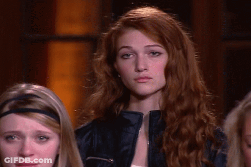Woman With Red Hair In Leather Jacket GIF