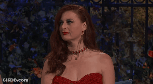Woman With Red Hair In Red Dress GIF