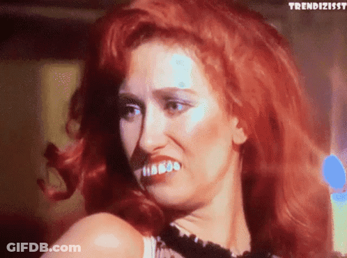 Woman With Red Hair Making Funny Face Trendizisst GIF