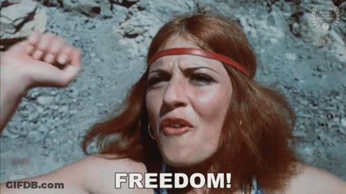 Woman With Red Hair Saying Freedom GIF